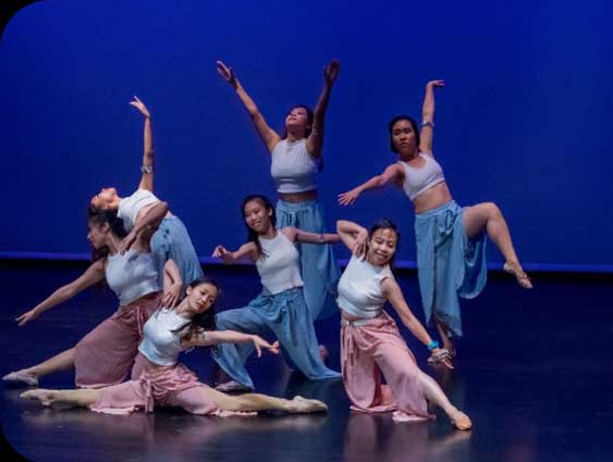 Dance students performing choreography at Dance Channel dance school in Singapore