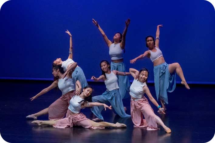 Dance students performing choreography at Dance Channel dance school in Singapore