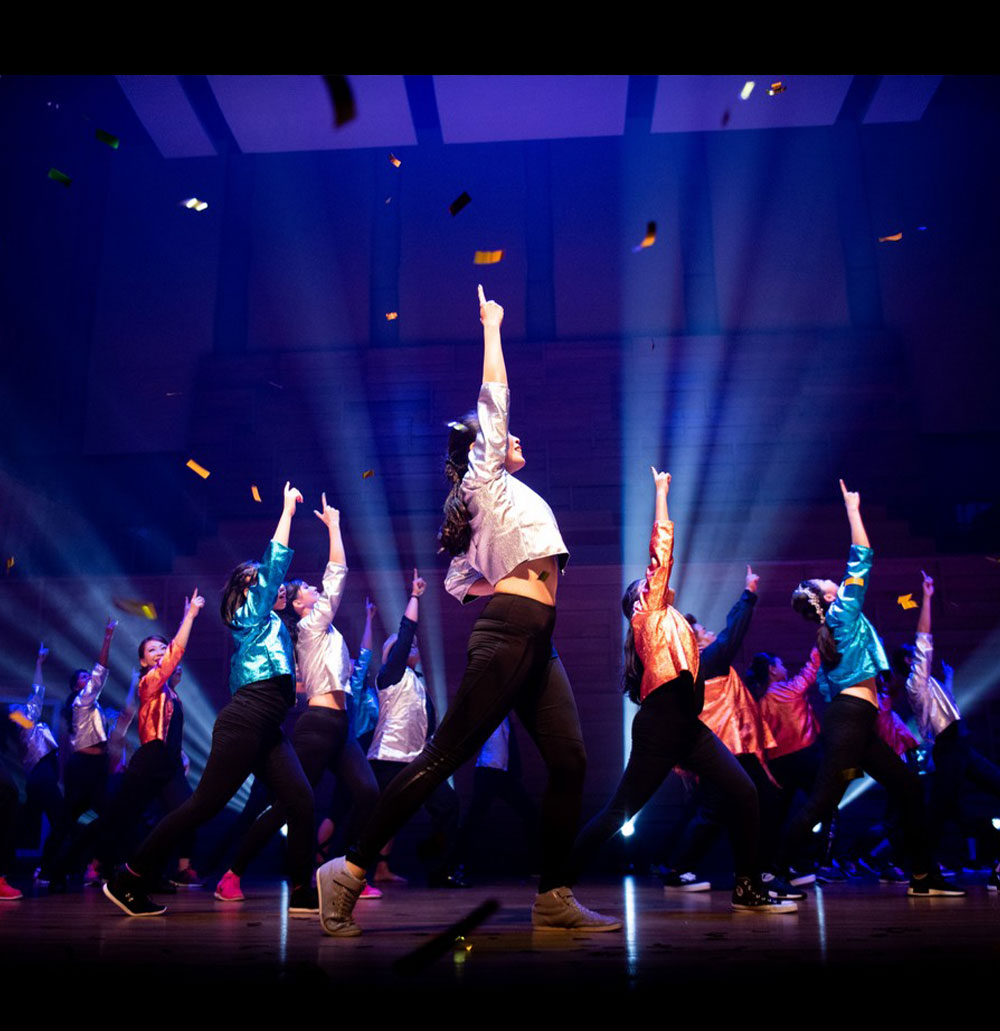 Dance class students performing on stage at Dance Channel Singapore